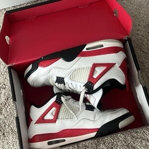 Jordan 4s red cement